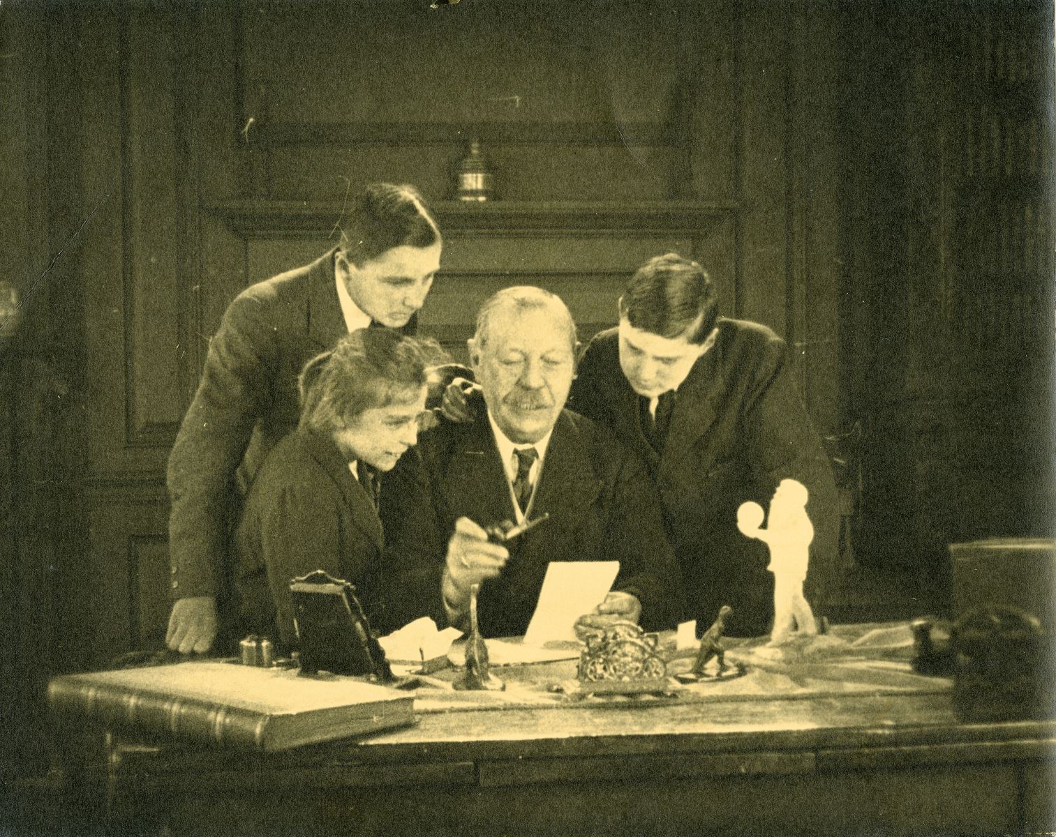 Conan Doyle at universal world studios looking at models from the film